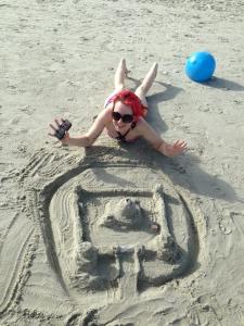 Just showing off a sand castle…and more skin than any modesty advocate would ever condone.